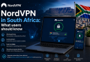 Editorial illustration showing NordVPN running on a laptop and smartphone against a South African city and Table Mountain backdrop.